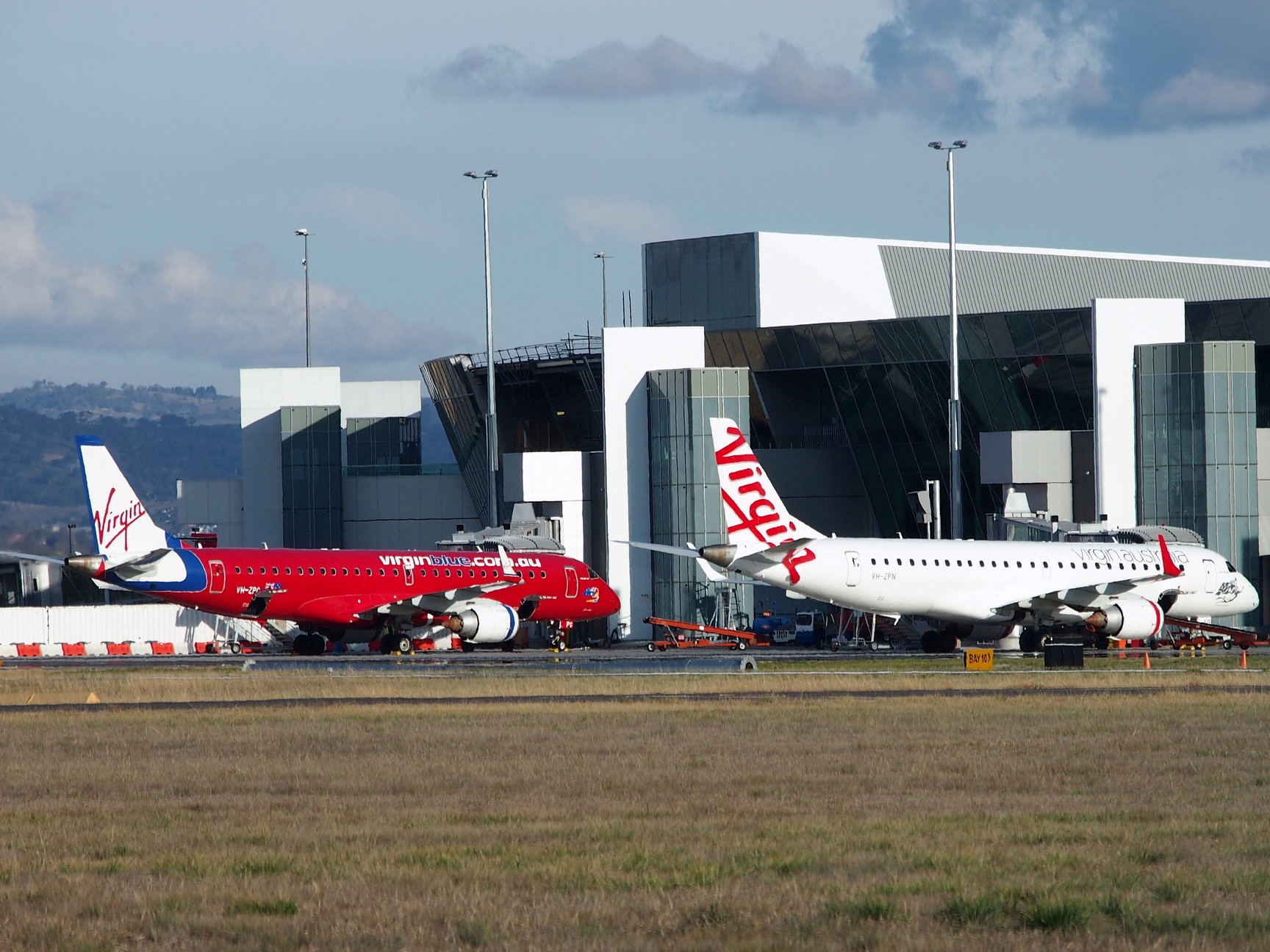 Two Virgin Airplanes | Alpha Airport Parking